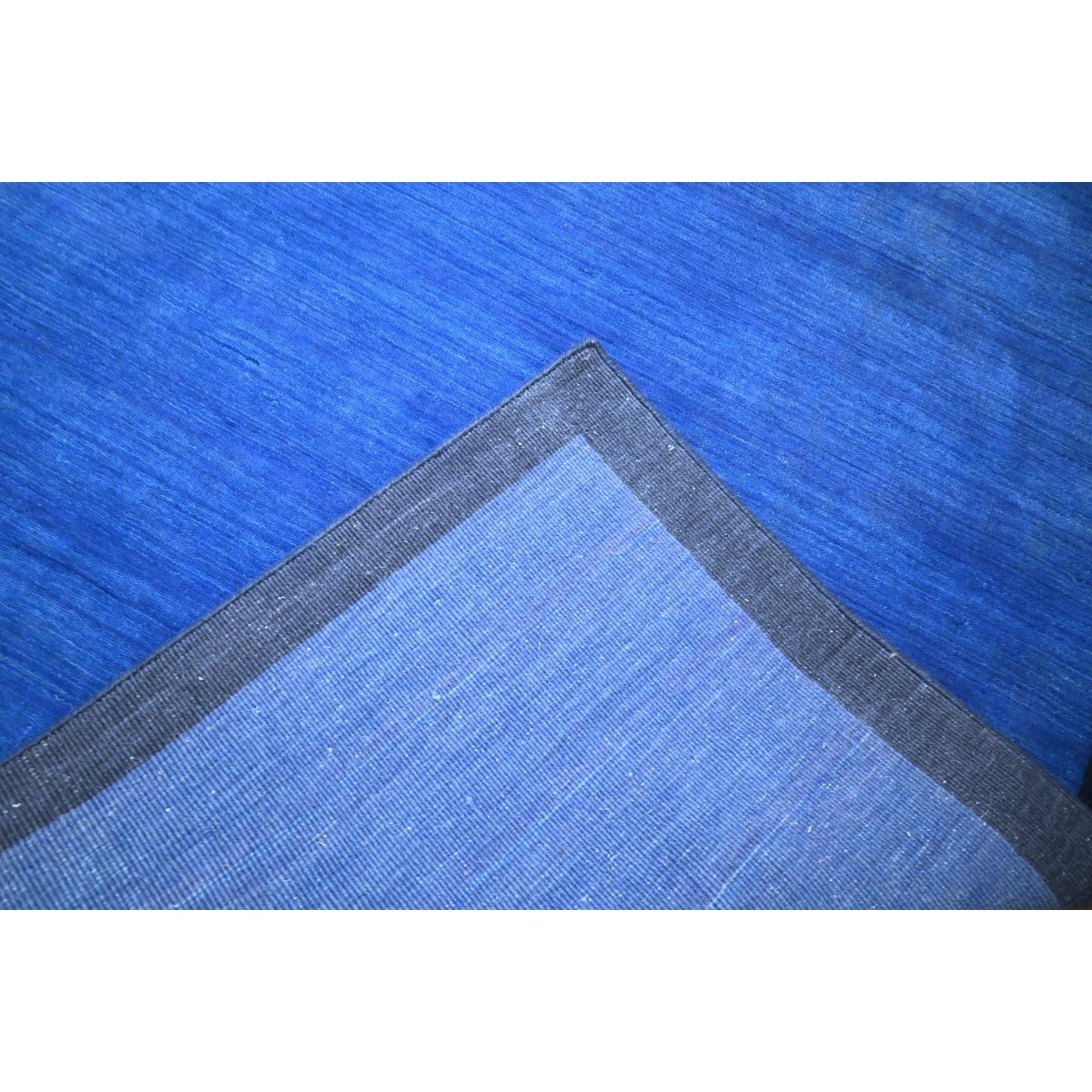Blauw modern vloerkleed - 205x140 cm - HANDMADE