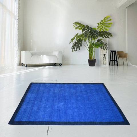 Blauw modern vloerkleed - 205x140 cm - HANDMADE